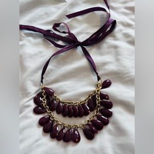 Purple tie neck teardrop jewled tiered necklace with gold accent